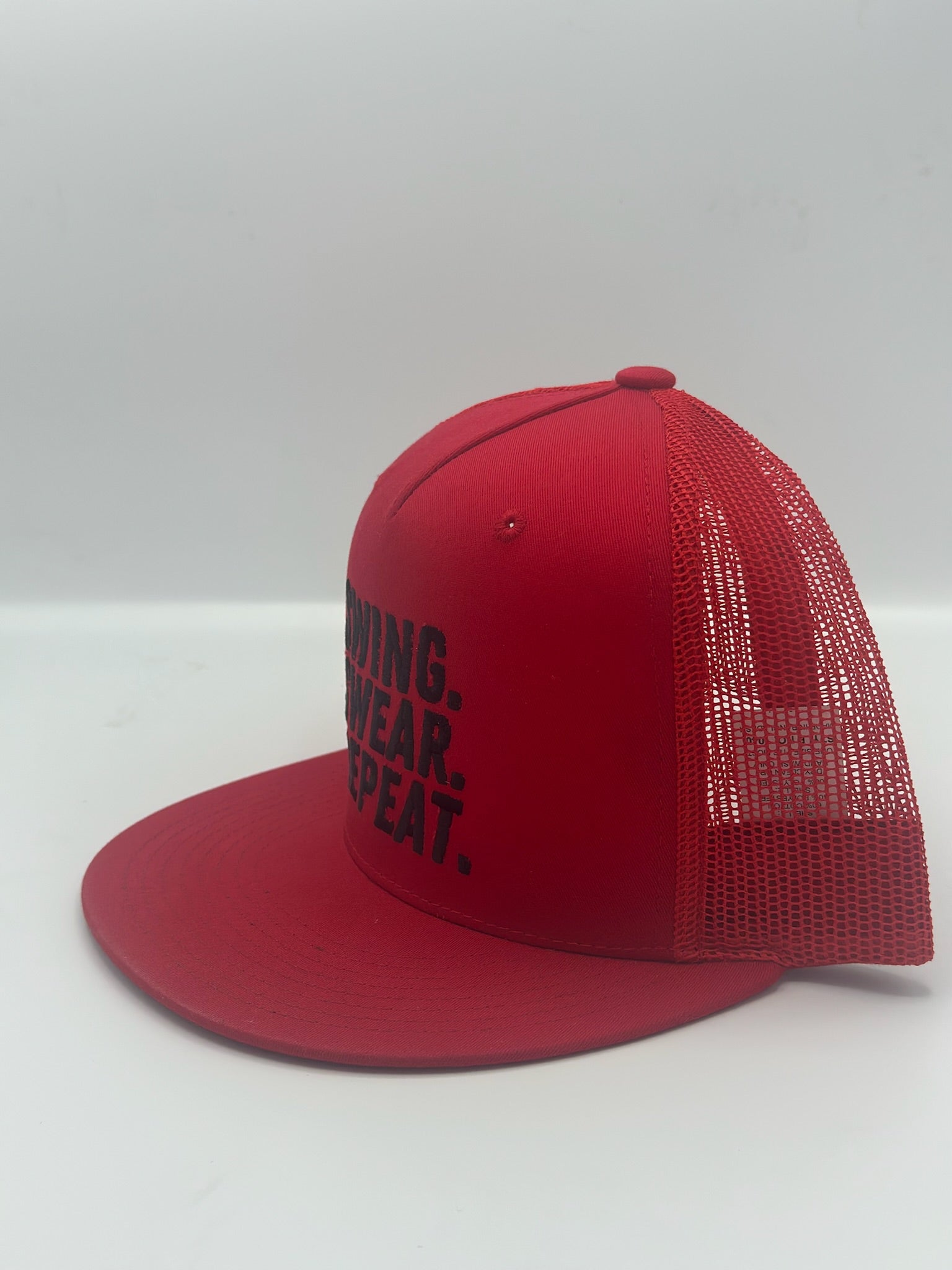 Swing, Swear, Repeat in red/black