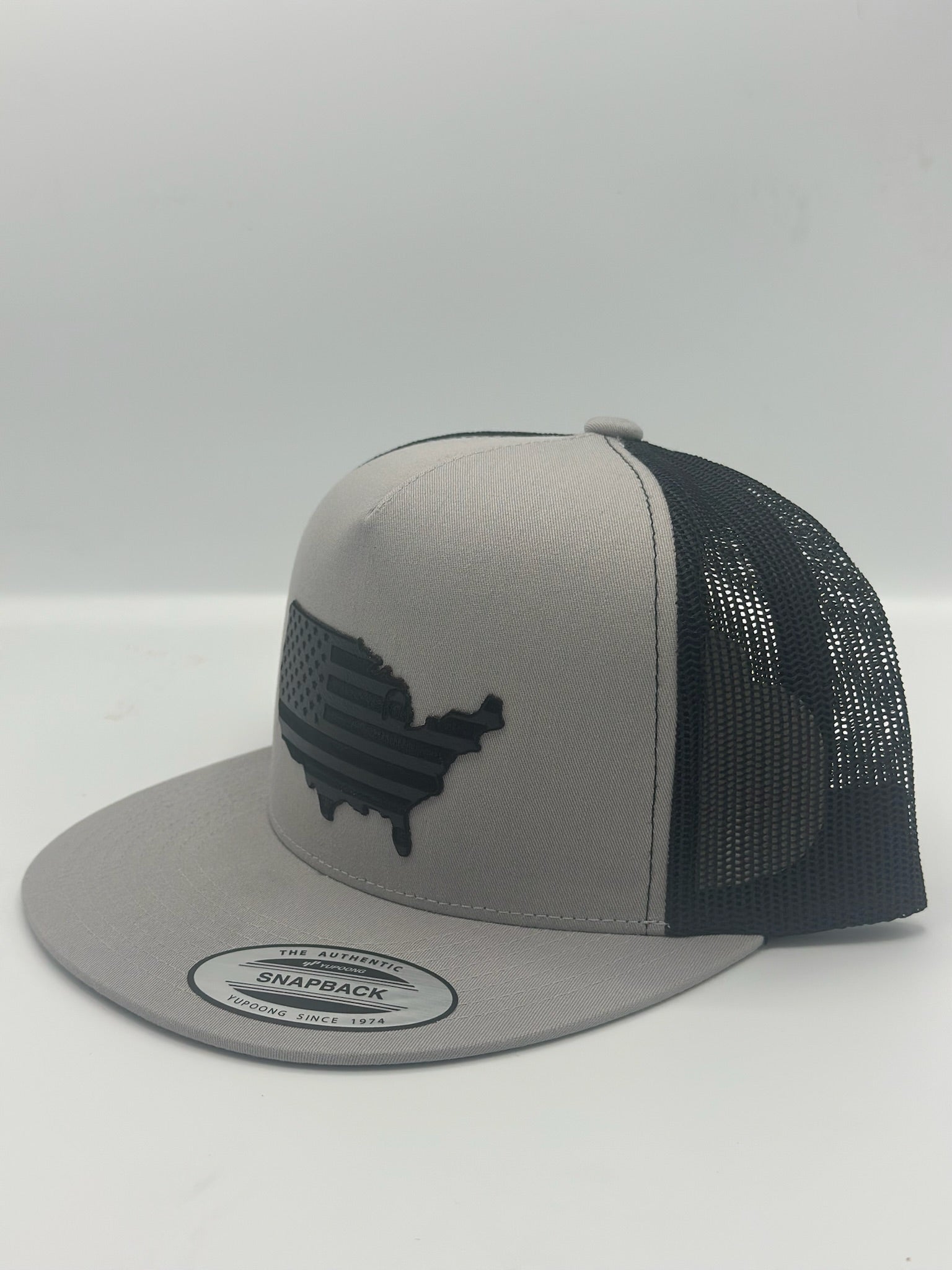Stealth America in grey/black with metal/black patch